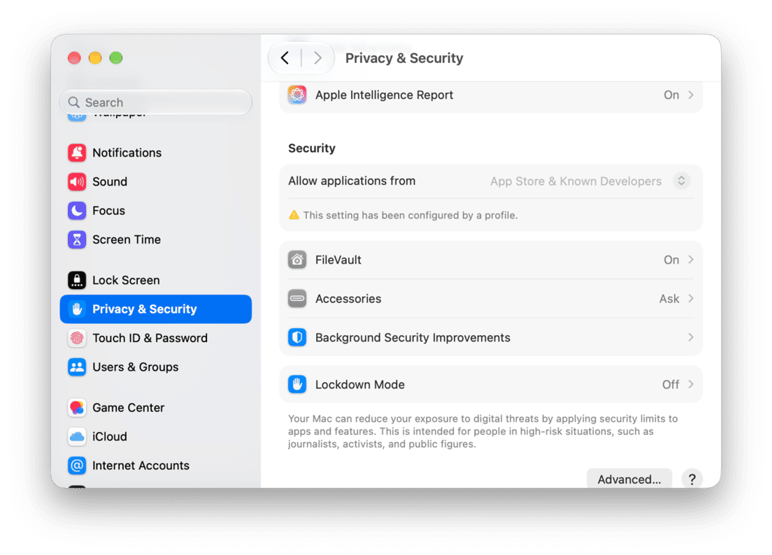 System Preferences - macOS Privacy & Security settings showing FileVault, Lockdown Mode and app permission controls